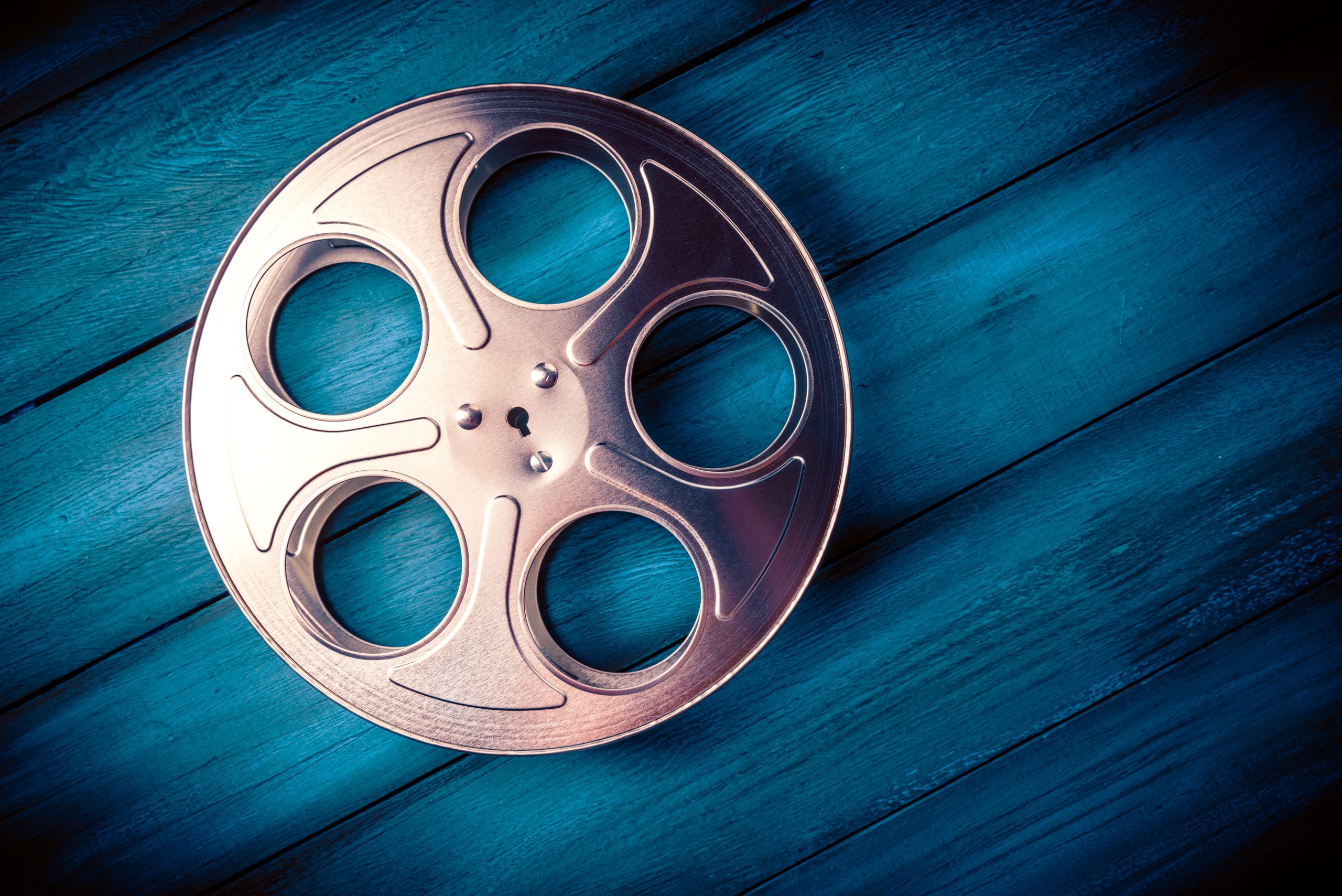 Image of a film reel for our article on 10 Most Iconic Movies About Professors