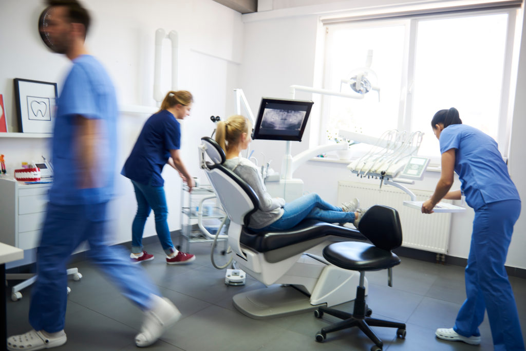 An image of dental hygienists for our Ultimate Guide to Trades Degrees and Careers