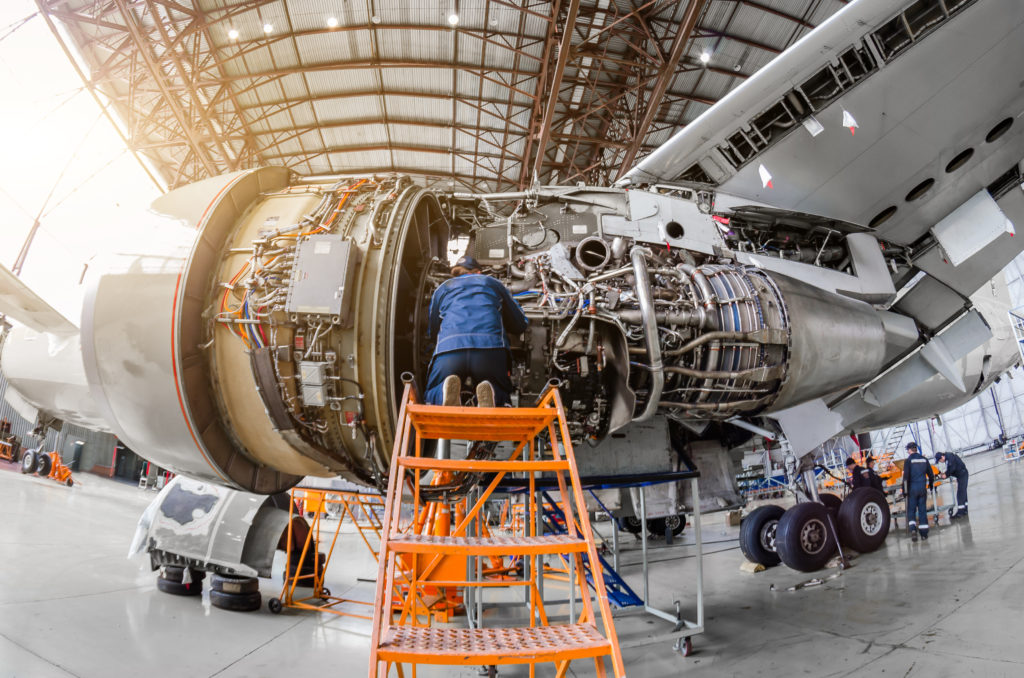 An image of an aviation mechanic for our Ultimate Guide to Trades Degrees and Careers