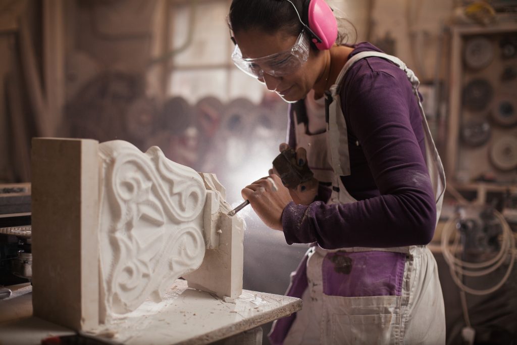 An image of a sculptor for our FAQ on What’s the Best Degree Path to Becoming an Artist