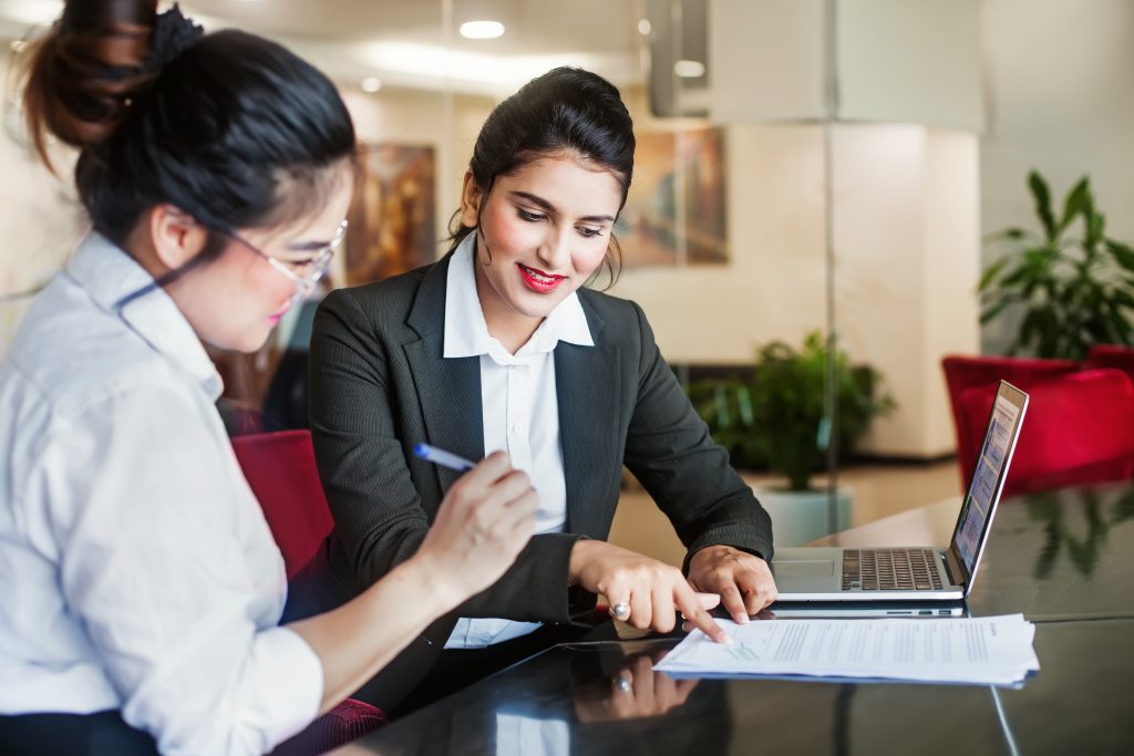 An image of a Bank Teller for our FAQ on How to Become a Bank Teller