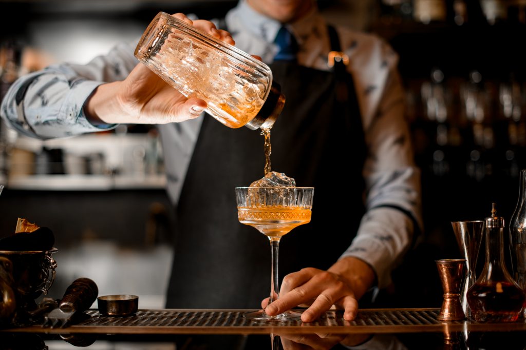 An image of a bartender for our FAQ on What Is the Best Degree Path for Becoming a Bartender