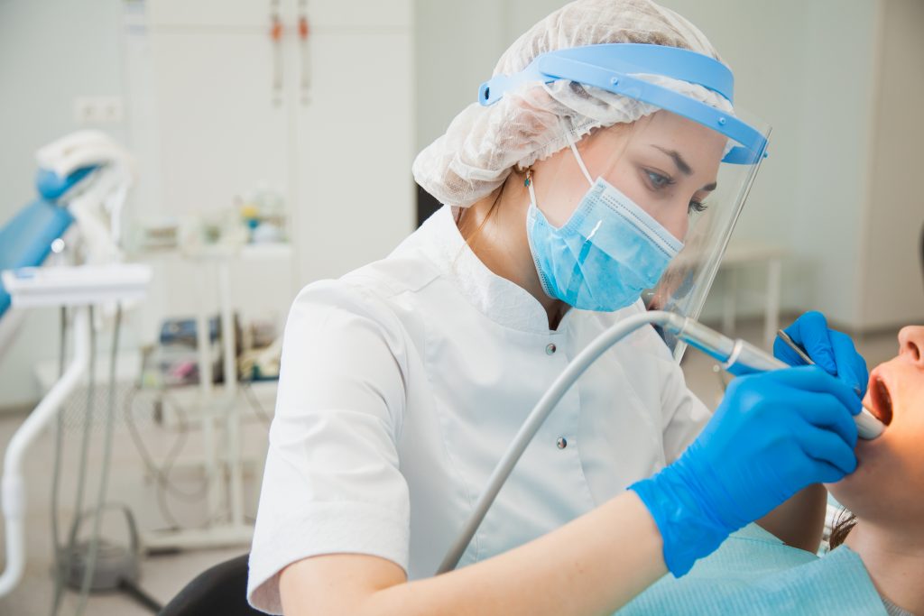 An image of a dental hygienist for our FAQ on What Is the Best Degree Path for Becoming a Dental Hygienist