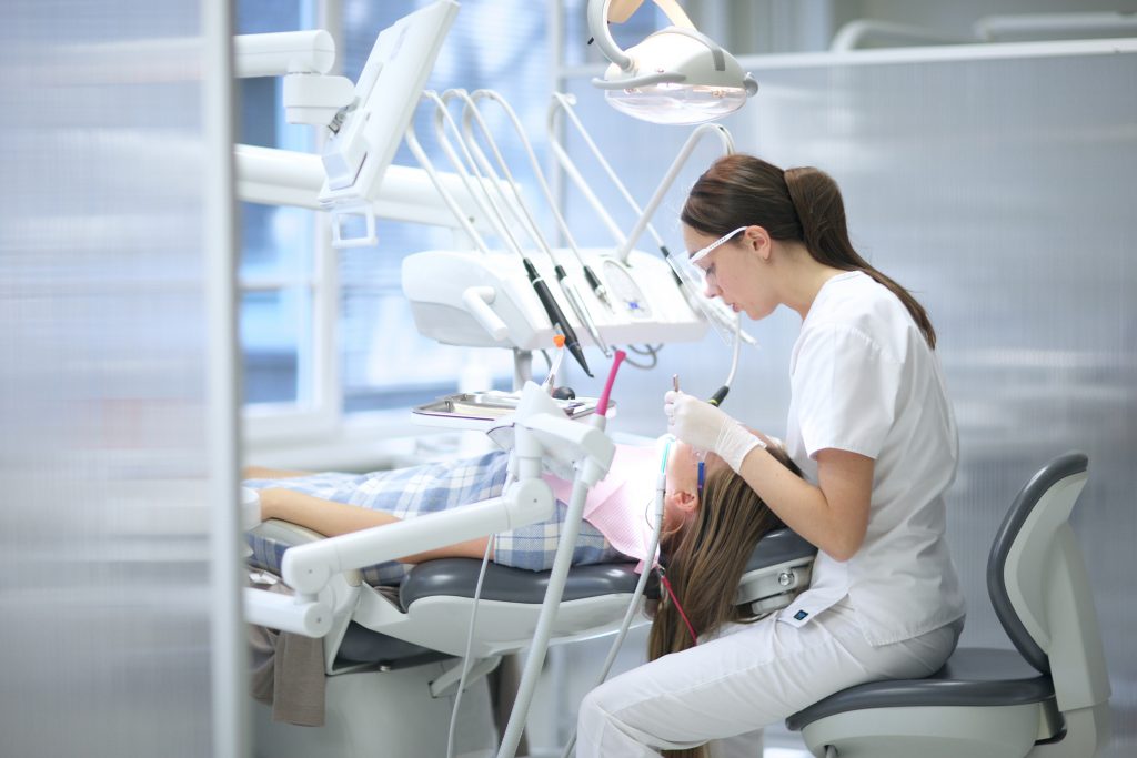 An image of a dental hygienist for our FAQ on What Is the Best Degree Path for Becoming a Dental Hygienist