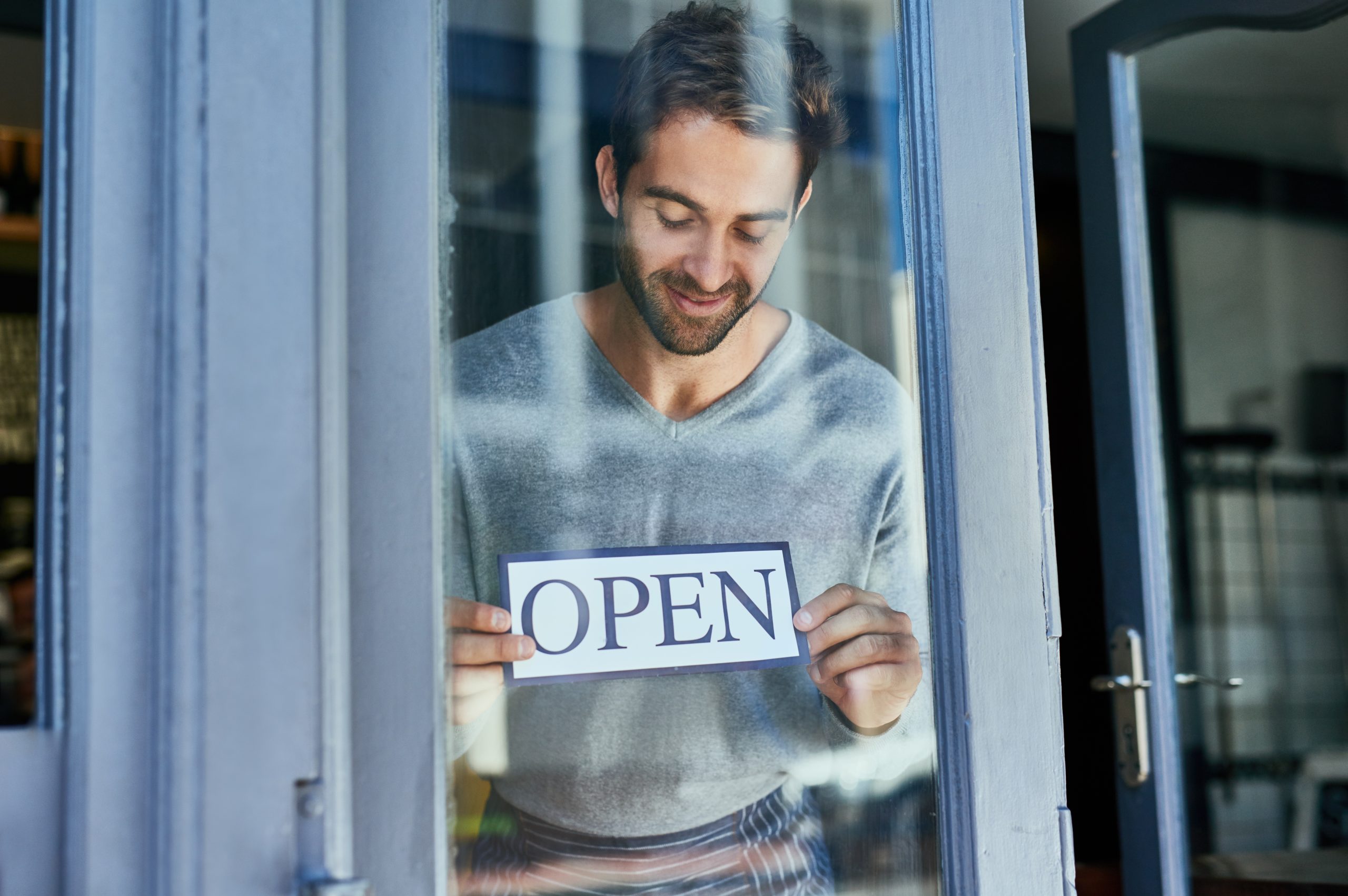 An image of a shop owner for our FAQ on How Long Does it Take to Get a Degree in Hospitality