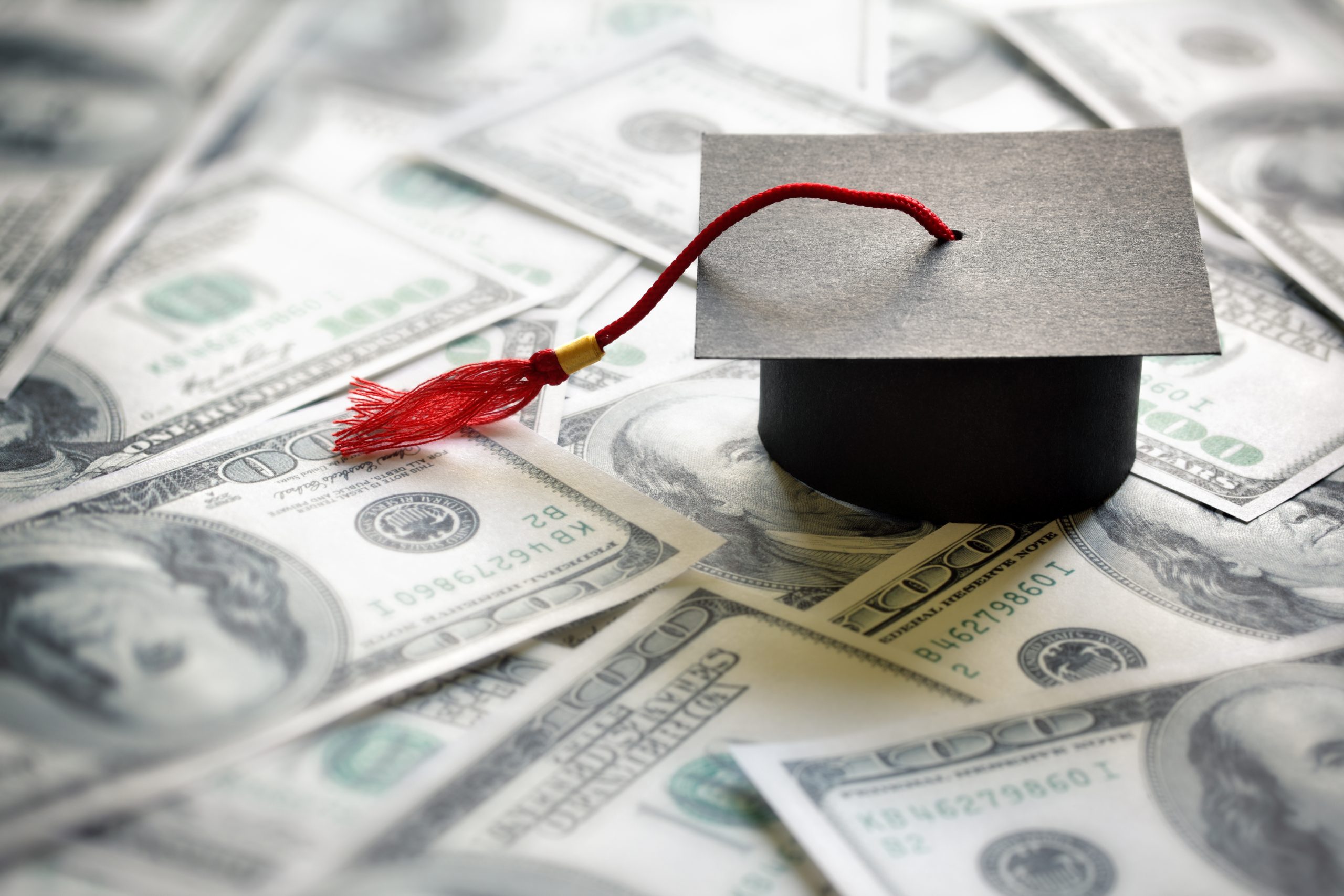 An image of a graduation mortar board on money for our FAQ on Does it Cost More to Attend a Small College?