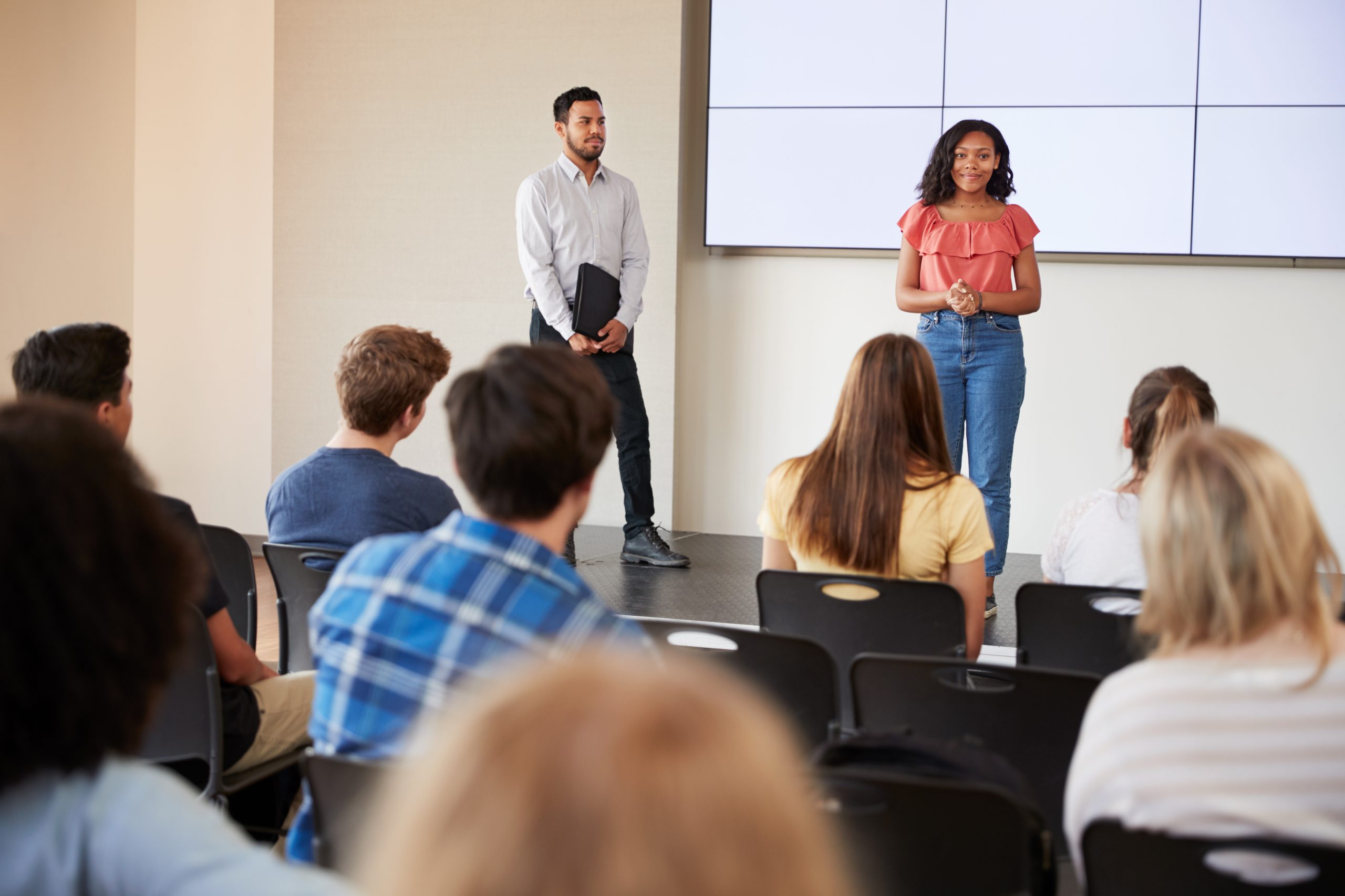 Image of communications student giving speech for our FAQ on What Career Paths Could I Pursue With a Bachelor’s Degree in Communications