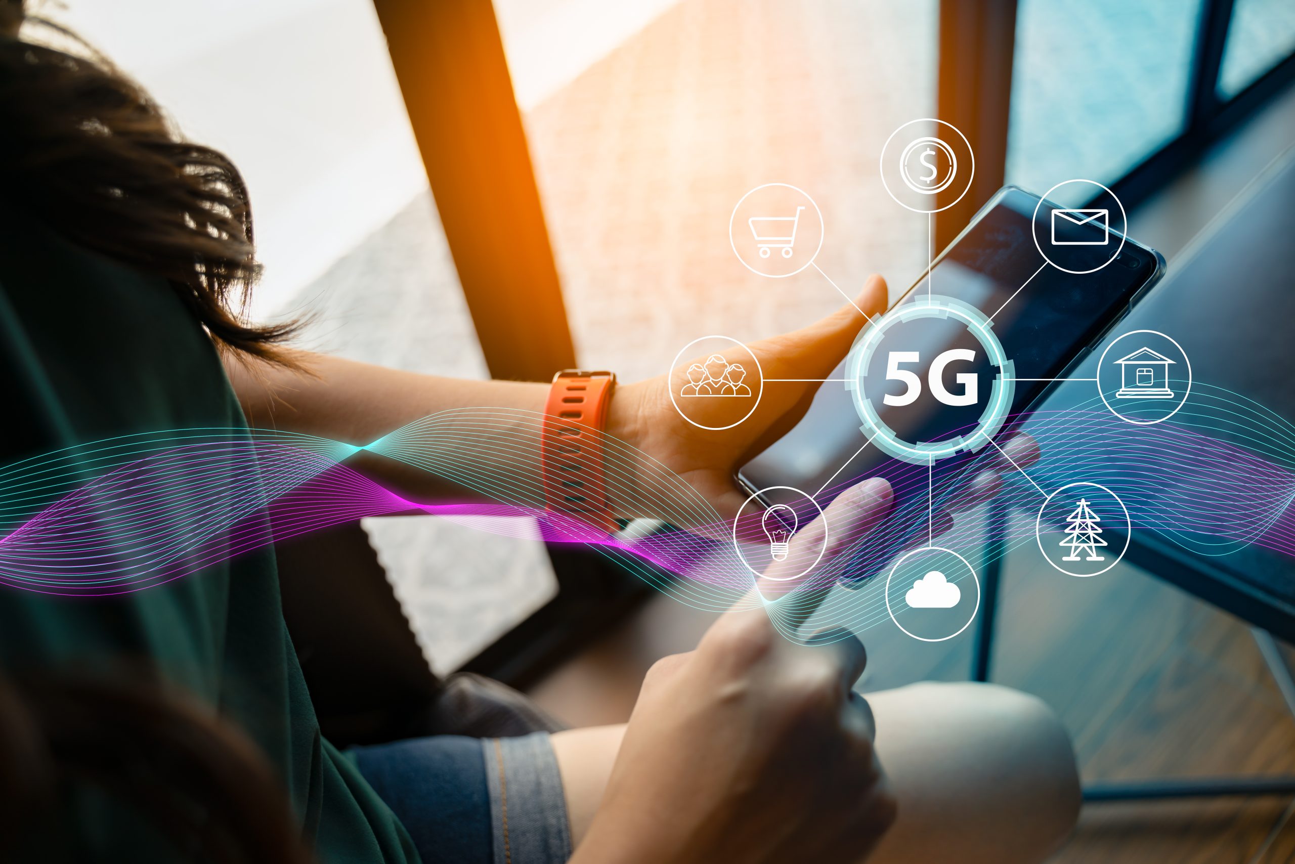 Image of woman on 5G tech for our FAQ on What is 5G Technology?