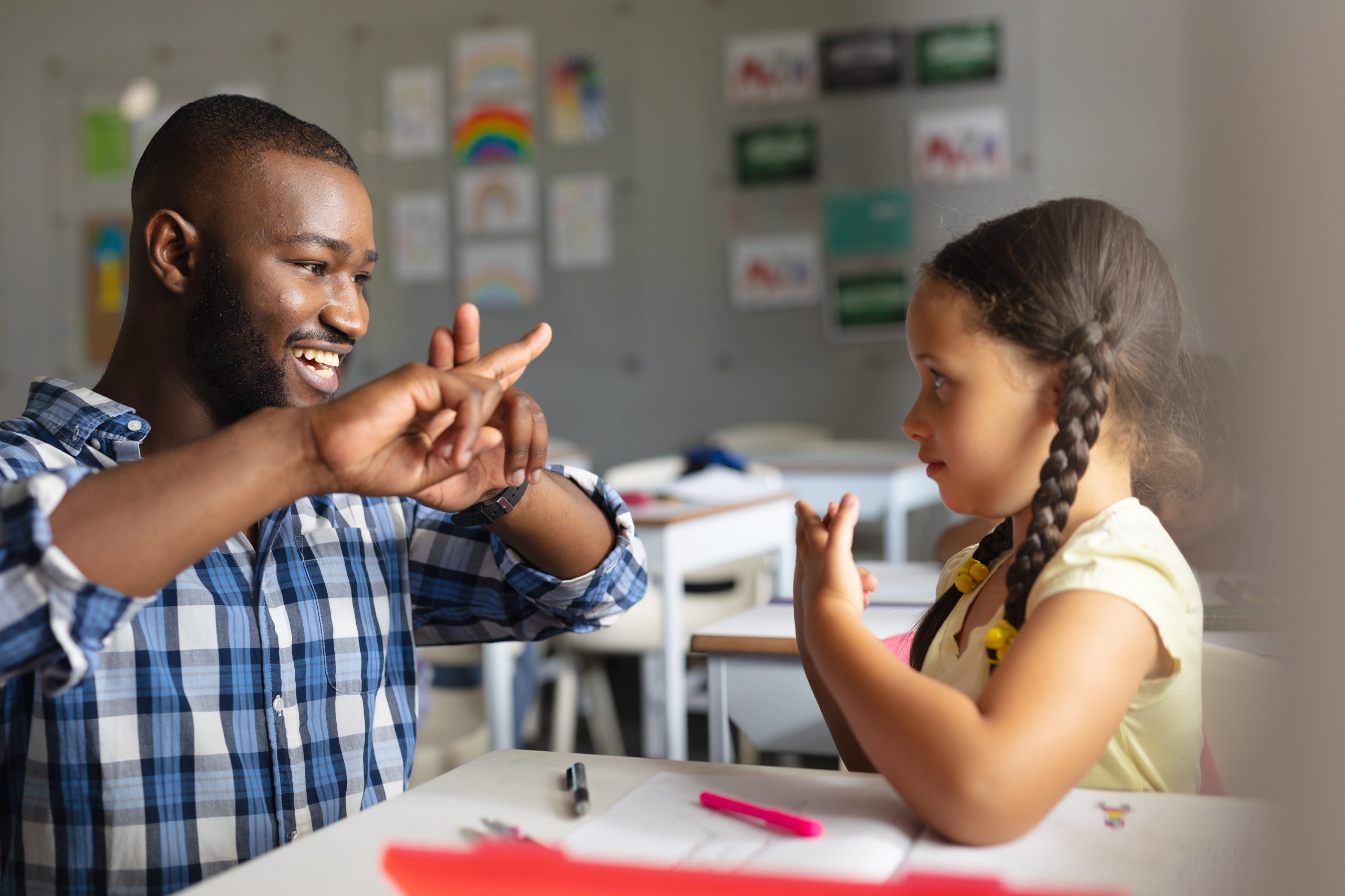 Image of sign language teacher for our article on 5 Top Paying Careers with a Bachelor’s in Sign Language Interpretation