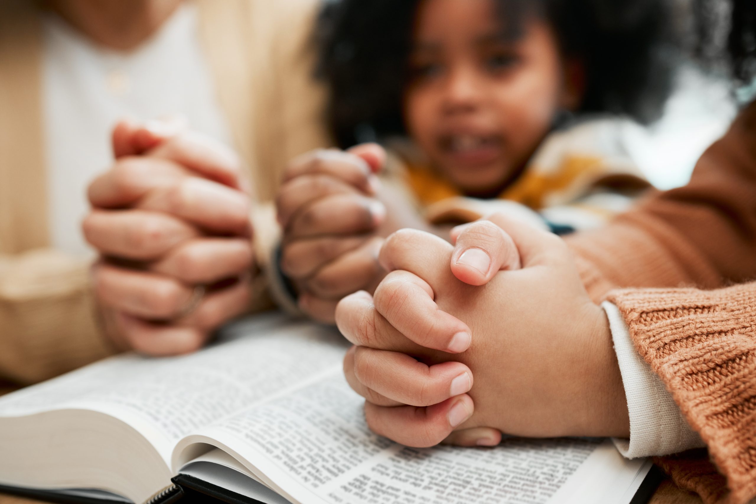 Image of children praying for our article on Bible Study Fun for Kids