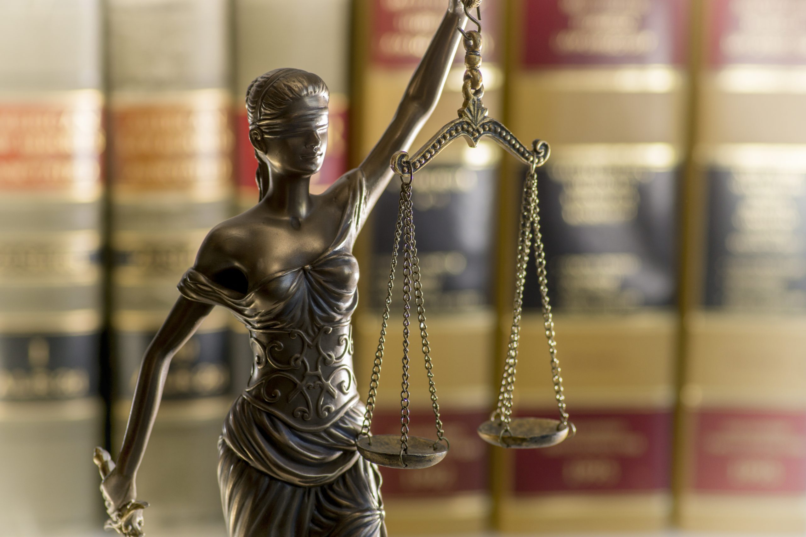 Image of lady justice statue for our FAQ on What Will I Study in an Online Criminal Justice Degree Program