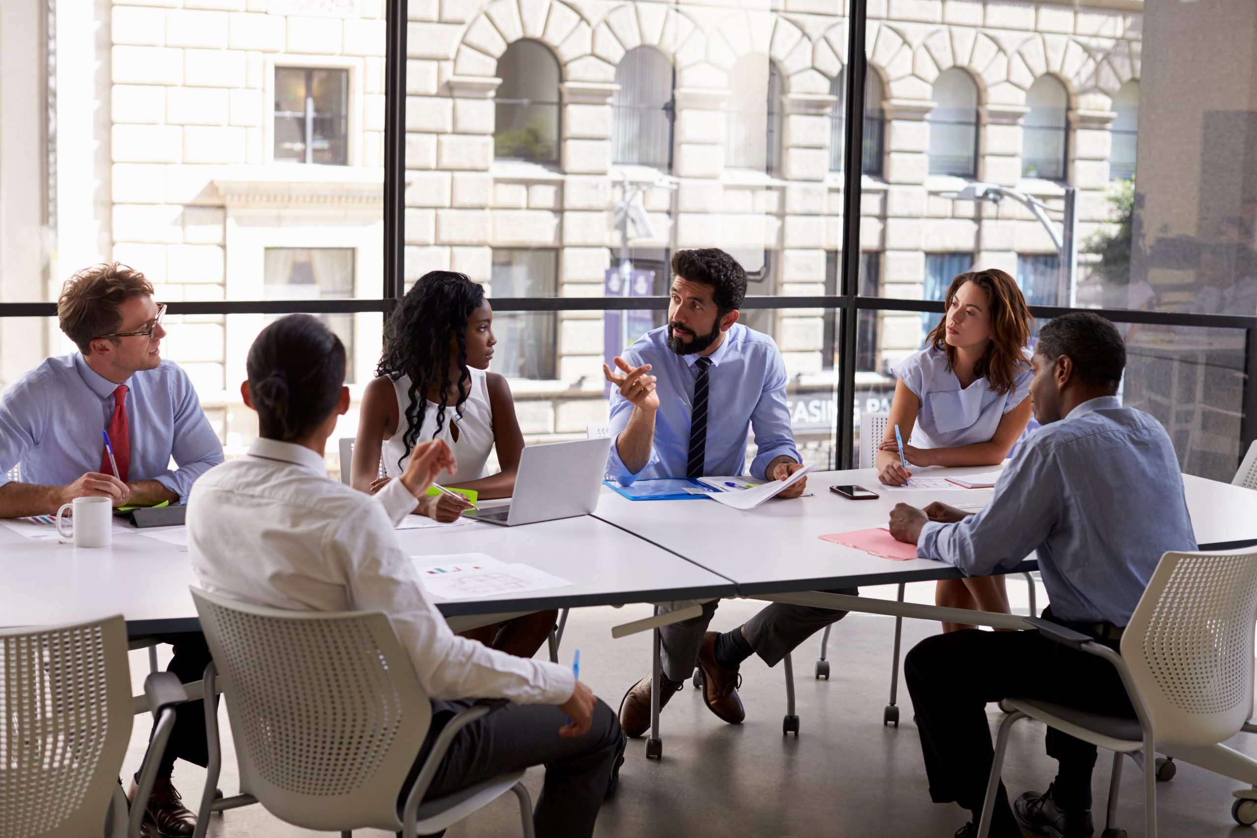 Image of business people for our list of 5 Differences Between Finance and Accounting