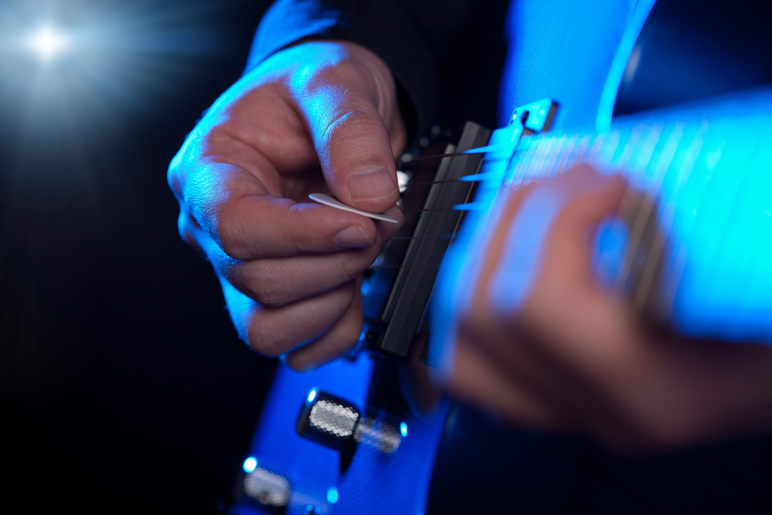 Image of guitarist for our article on 5 TED Talks about Music