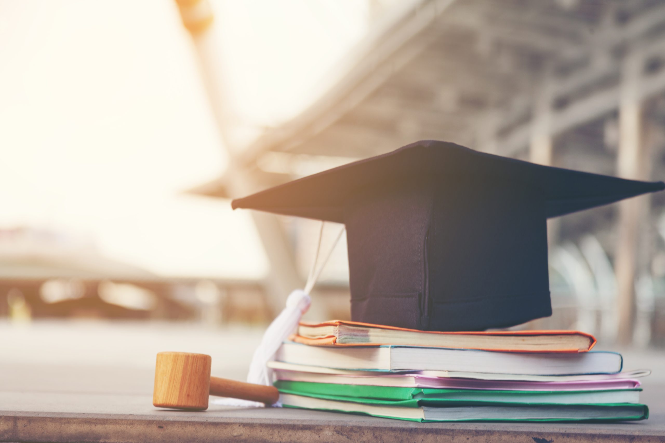 Image of graduation cap and gavel for our article on 5 Great Specializations for Online Criminal Justice Students